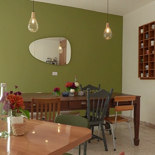 A_minimalist_dining_area_with_modern_furniture_and_decor_ours