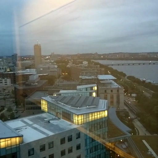 Panoramic_cityscape_at_dusk,_showing_urban_buildings_and_lights_ours
