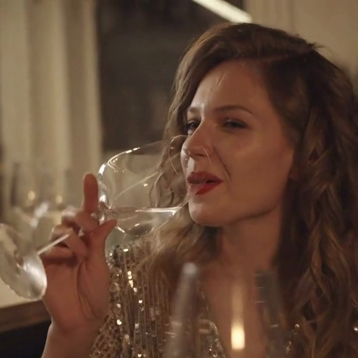a_woman_sipping_wine_ours